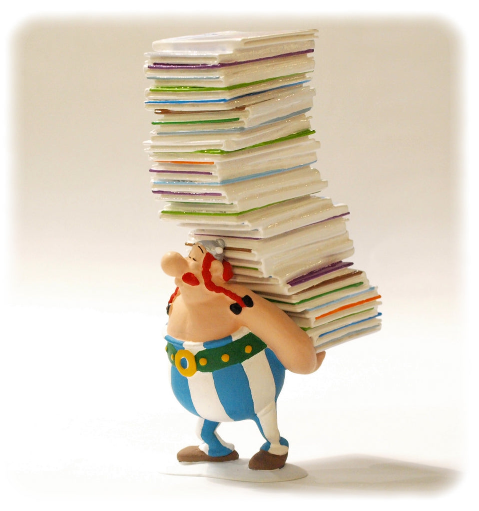 ASTERIX: OBELIX PORTANT LES ALBUMS, COLLECTION "PILES & FACES" - figurine métal 15 cm